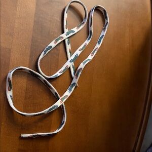 38.5” one shoelace White Shoelaces with Crocodile Pattern (maybe Lecoste)